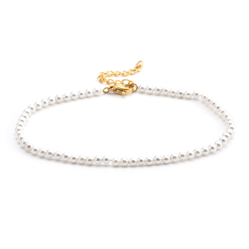 Chaîne de cheville dorée petites perles blanches